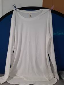 lot 71 image: Large White Long Sleeve Shirt  - Retail $0