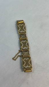 lot 49 image: Ornamental Segmented Link Bracelet with Safety Chain