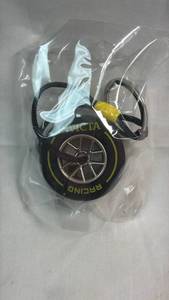 lot 55 image: Invicta Racing Tire Keychain