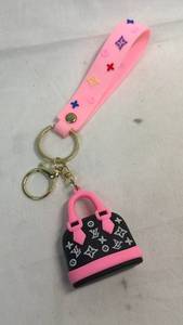 lot 56 image: LV-Inspired Miniature Handbag Keychain with Pink Strap