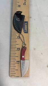 lot 59 image: Mini Fixed Blade Knife with Sheath and Chain