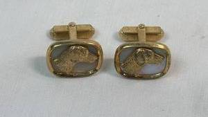 lot 91 image: Pair of Cufflinks with Dog Head Design