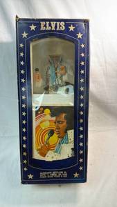 lot 111 image: Elvis Presley Commemorative Decanter McCormick Distilling Co. 86 Proof Straight Bourbon Whiskey (Missing Head)
