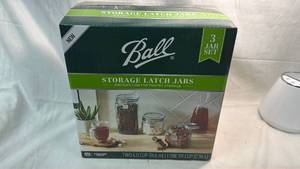 lot 115 image: Ball Storage Latch Jars 3-Piece Set Super Wide Mouth Airtight Lids, Sells for $60.