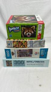 lot 171 image: Lot of 4 Puzzles Hasbro Junior Bits Pieces 100-1000 Pieces