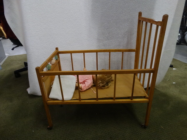 lot 1674 image: Vintage Wooden Doll Bed w Doll