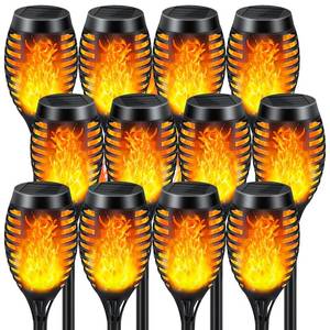 lot 1557 image: Solar Lights Outdoor 12 Pack, Solar Torch Light with Flickering Flame, Waterproof Outdoor Lighting Solar Powered Pathway Lights, Decoration Lighting for Garden Yard Patio, Auto OnOff - Retail $35