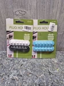 lot 123 image: Adhesive Wall Plug Holders Cable Management Set - Retail $3