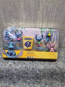 lot 147 image: Disney Stitch Collectible Figure Set 7 Pieces - Retail $15