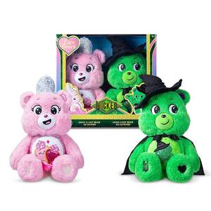 lot 162 image: Care Bears x Wicked 2pk Love-a-Lot Bear as Glinda & Good Luck Bear as Elphaba Stuffed Animals, Polyester Material, 2 Pieces - Retail $37