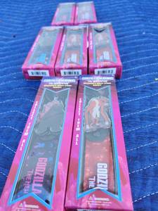 lot 213 image: Godzilla x Kong The New Empire Keychain & Wrist Strap Bundle Lot - Retail $8