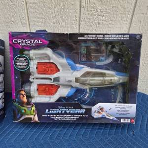 lot 300 image: Mattel Disney Pixar Lightyear Test & Crash XL-01 Crystal Grade - Retail $0