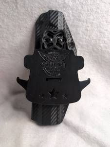 lot 3502 image: Harley-Davidson American Man Holster with Carbon Fiber Pattern