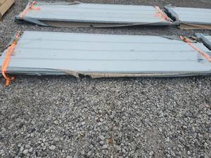 lot 7019 image: Unused Qty. 50 Galvalume Steel Siding  Roofing Panels  White  Cream  Some Metal has damage