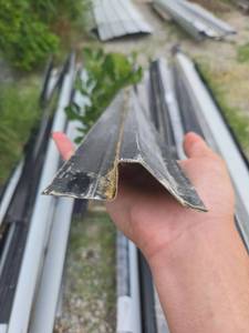 lot 11004 image: Black metal Roofing panals and trims