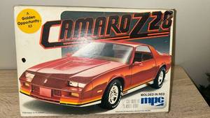 lot 10 image: Vintage model kit from 1982 New , MPC Camaruzzi 125 Scale Model Kit, Molded in Red