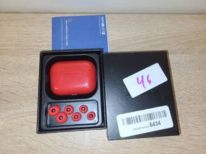 lot 46 image: Red Wireless Earbuds with Charging Case and Silicone Ear Tips