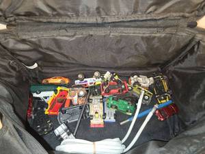 lot 141 image: Lot of Die-Cast Toy Cars and Vehicles in Black Carrying Case