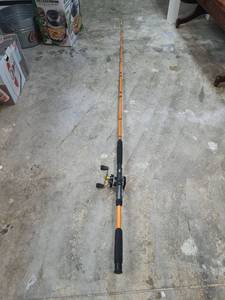 lot 144 image: Fishing Rod and Reel Combo Orange and Black