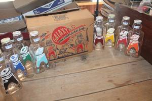 lot 1754 image: IOB Vtg. Galaxy Home Syrup Glass Bottles