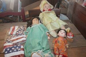 lot 1830 image: Antique Dolls and NIP Beach Balls