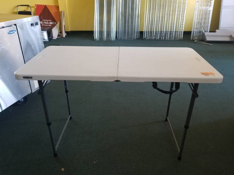 lot 7759 image: 4 FT Lifetime Folding Table