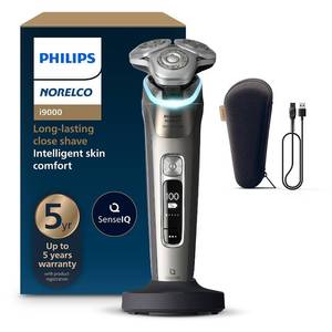 lot 18901 image: Philips Norelco Shaver i9000 Prestige - Wet &amp Dry Electric Shaver, Gold Oyster, Sense IQ Technology, Triple Lift &amp Cut System, 360 Rotating Dual SteelPrecision Blades, Quick Clean Pod, Model XP920381 - Retail $199.99