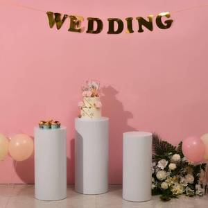 lot 18990 image: Metal Display Pedestal Stand,Cylinder Pedestal Stands for Parties Wedding Birthday Decoration,Cake Stand Dessert Display White Set of 3, Size 23.6x10.6 & 25.5x11.8 & 27.5x13