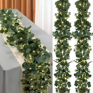lot 17392 image: Eucalyptus Garland with Lights, 2 Packs 6FT Green Flower Garland Decor, Artificial Faux Eucalyptus Leaves Greenery Vines for Table Runner Wedding Centerpieces Backdrop Decorations (Warm Color)