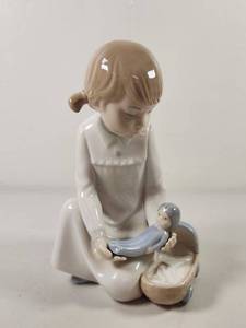 lot 74 image: Nao Lladro Spain Girl with Baby Doll