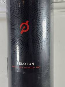 lot 116 image: Peloton Reversible Workout Mat 71 x 26 inches New