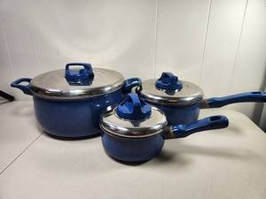 lot 214 image: T-fal Resistal 3-Piece Cookware Set Blue Handles Lids