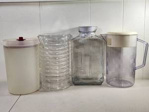 lot 219 image: Lot of 3 Pitchers with Lids  Storage Container