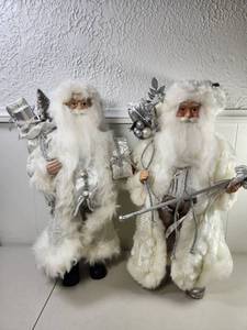 lot 312 image: Pair of Decorative Santa Claus Figurines with White Fur and Silver Accessories