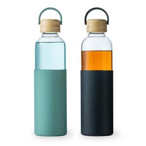 lot 7515 image: wangsdjy 34oz Glass Water Bottles with Silicone Sleeve, BPA Free Water Bottle Glass with Leak-Proof Lid, Reusable Water Bottle for Hot & Cold, Ideal for Hiking Travel Gym office (GreenBlack) - Retail $23