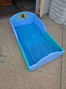 lot 7 image: Blue Toddler Bed with Headboard and Footboard
