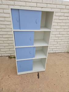 lot 16 image: 4-Shelf Storage Cabinet with Blue Doors and Open Compartments
