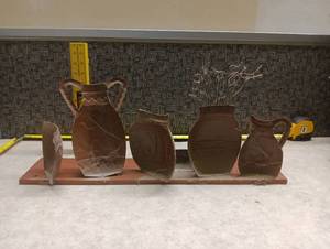lot 443 image: 6-Piece Decorative Pottery Vessels Collection on Display Base