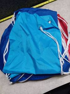 lot 521 image: Drawstring Bags with White Rope Handles, Cyan Blue, Dark Blue, Bright Red - lot of approximately 28