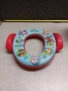 lot 593 image: Paw Patrol Toilet Seat Reducer with Handles