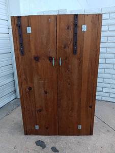 lot 610 image: Two-Door Wood Cabinet with Shelves and Metal Handles