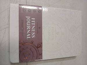 lot 13874 image: Fitness Workout Journal for Women & Men, A5(5.5 x 8.2) Workout Log Book Planner for Tracking, Progress, and Achieving Your Wellness Goals - Beige - Retail $15