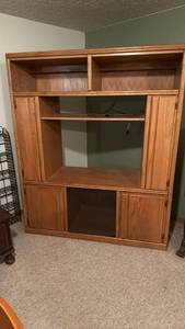 lot 903 image: Entertainment center 72x60x22 located in basement