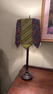 lot 917 image: Table top lamp with necktie shade 28in tall located in basement