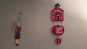 lot 918 image: Wooden wall art located in basement