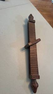 lot 1014 image: Wooden musical instrument similar to guiro