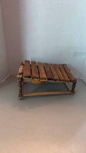 lot 1021 image: Balafon, a traditional West African xylophone made with hardwood keys and gourd resonators.