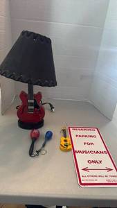 lot 1032 image: Red Electric Guitar Lamp with Black Shade, and decor