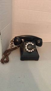 lot 1040 image: Black Rotary Dial Telephone with Brown Coiled Cord