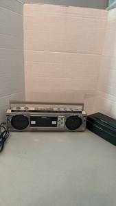 lot 1043 image: Panasonic Ambience Dual Cassette Boombox FMAM Radio with cassette tape case